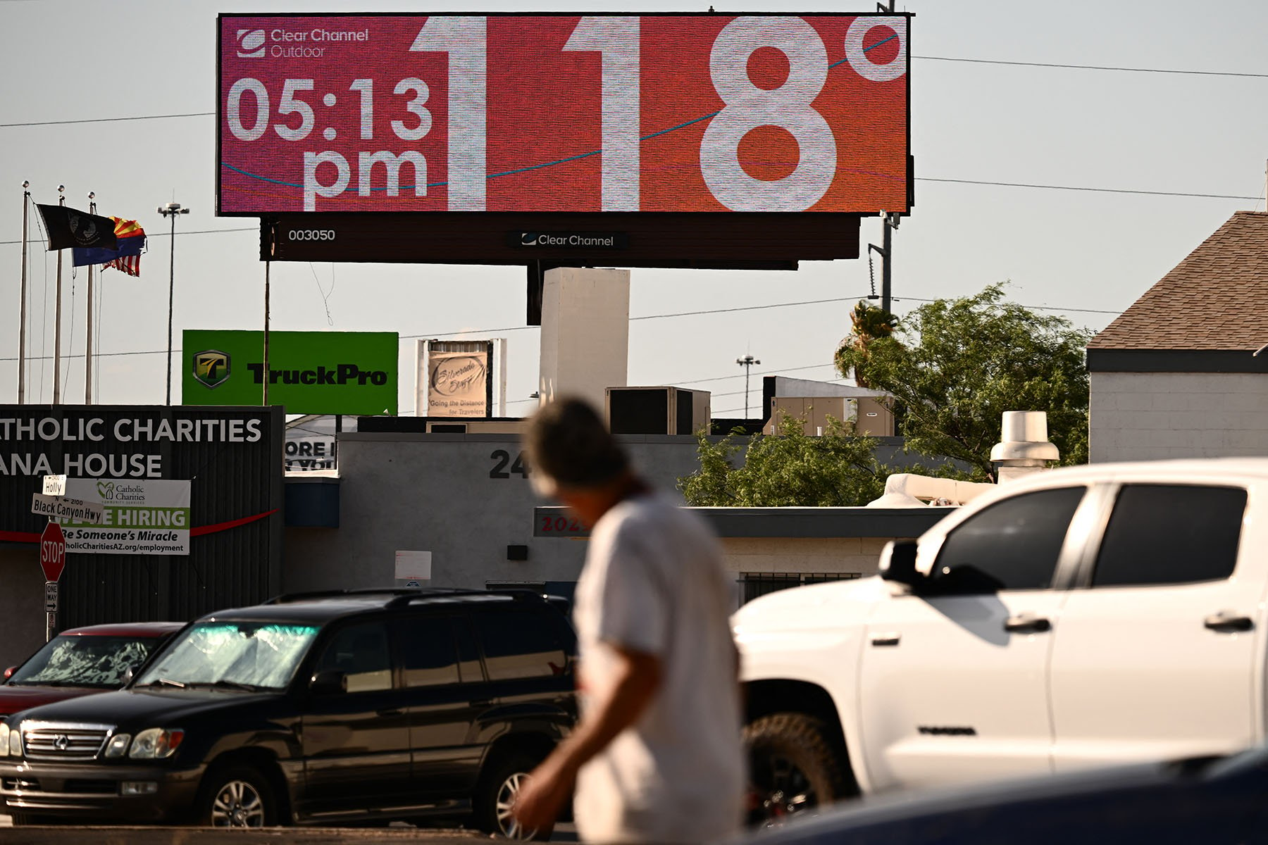 A billboard displays a temperature of 118 degrees Fahrenheit during a record heat wave in Phoenix, Arizona.
