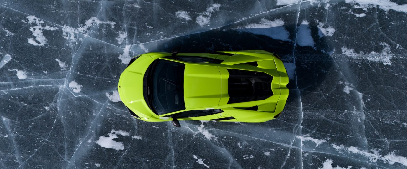 Behind the wheel of Lamborghinis ripping across a frozen lake