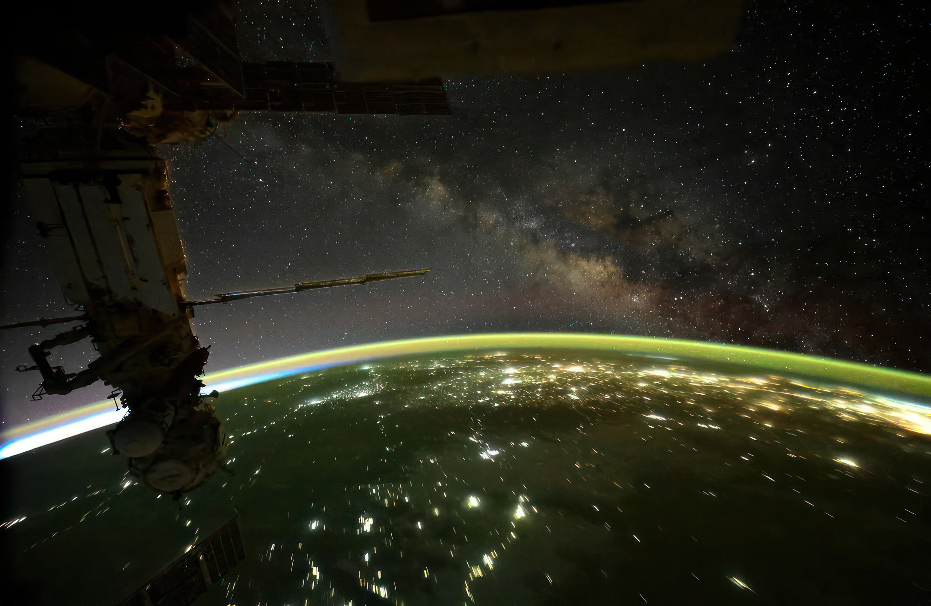 milky way and aurora over earth