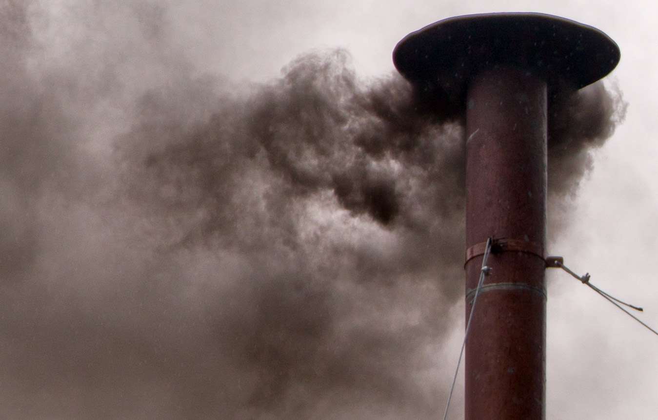 Black smoke rises from the chimney of the Sistine Chapel in Vatican City, on