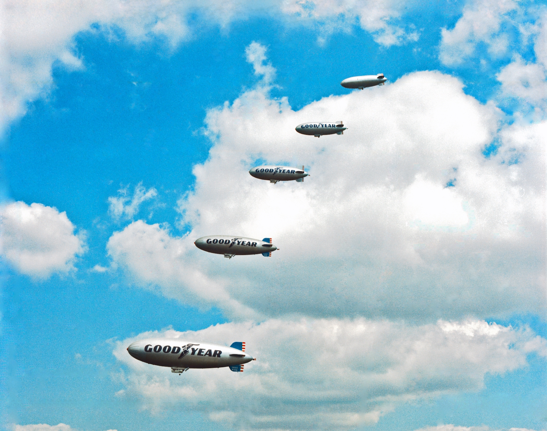 In the largest gathering of Goodyear Blimps since the 1930s, five Goodyear Blimps, including two newly built and one headed into retirement, fly above Akron, Ohio on September 10, 1969.