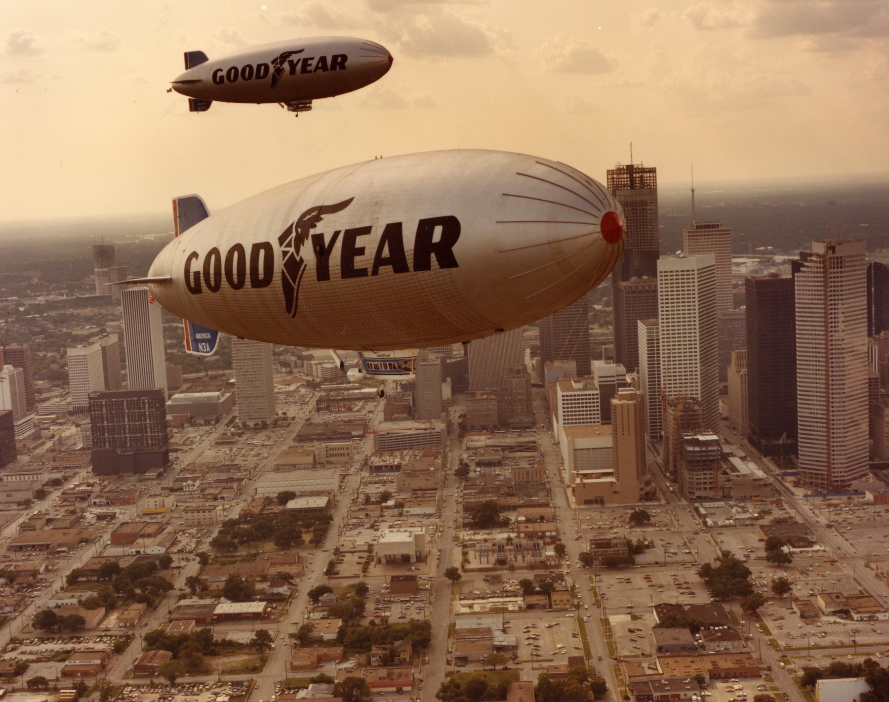 Here two Goodyear Blimps fly over nearby Houston in celebration of the new home.