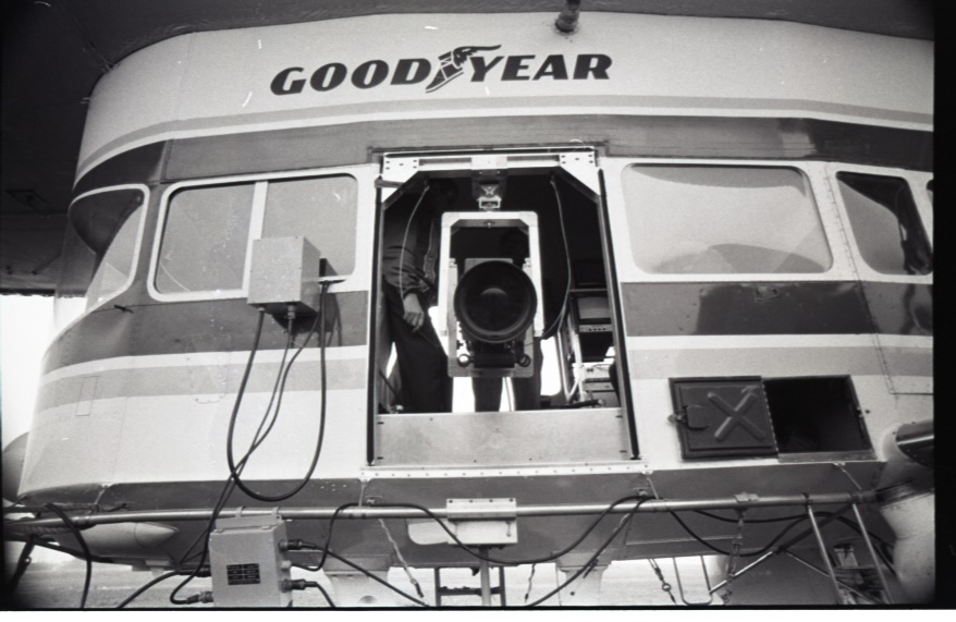 large camera pointing out of blimp