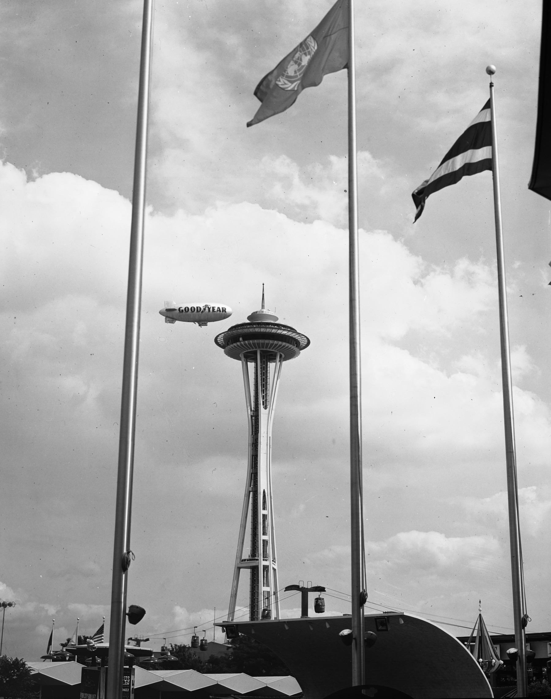 blimp flying by seattle's needle