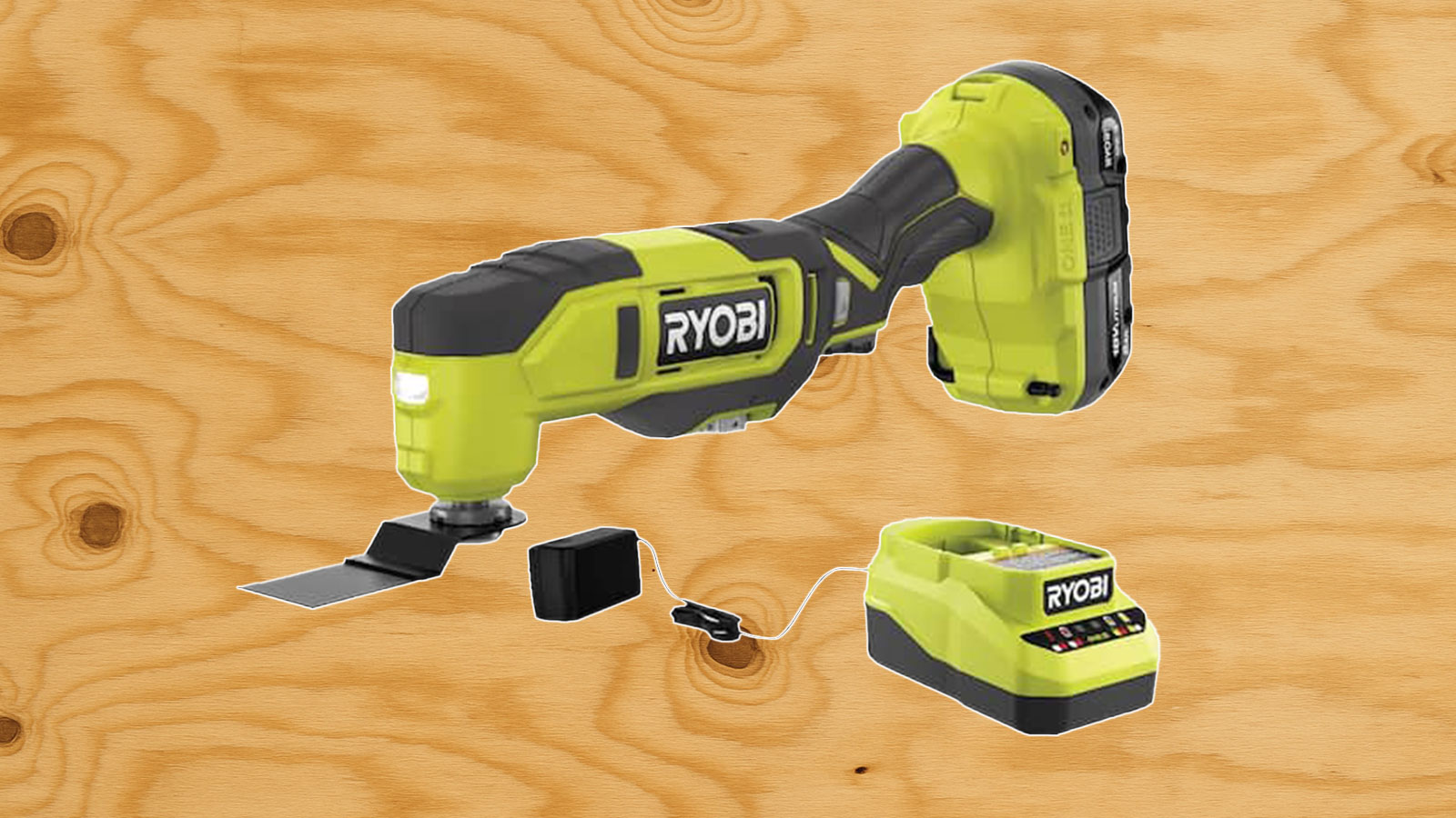  A Ryobi multitool in front of plywood.