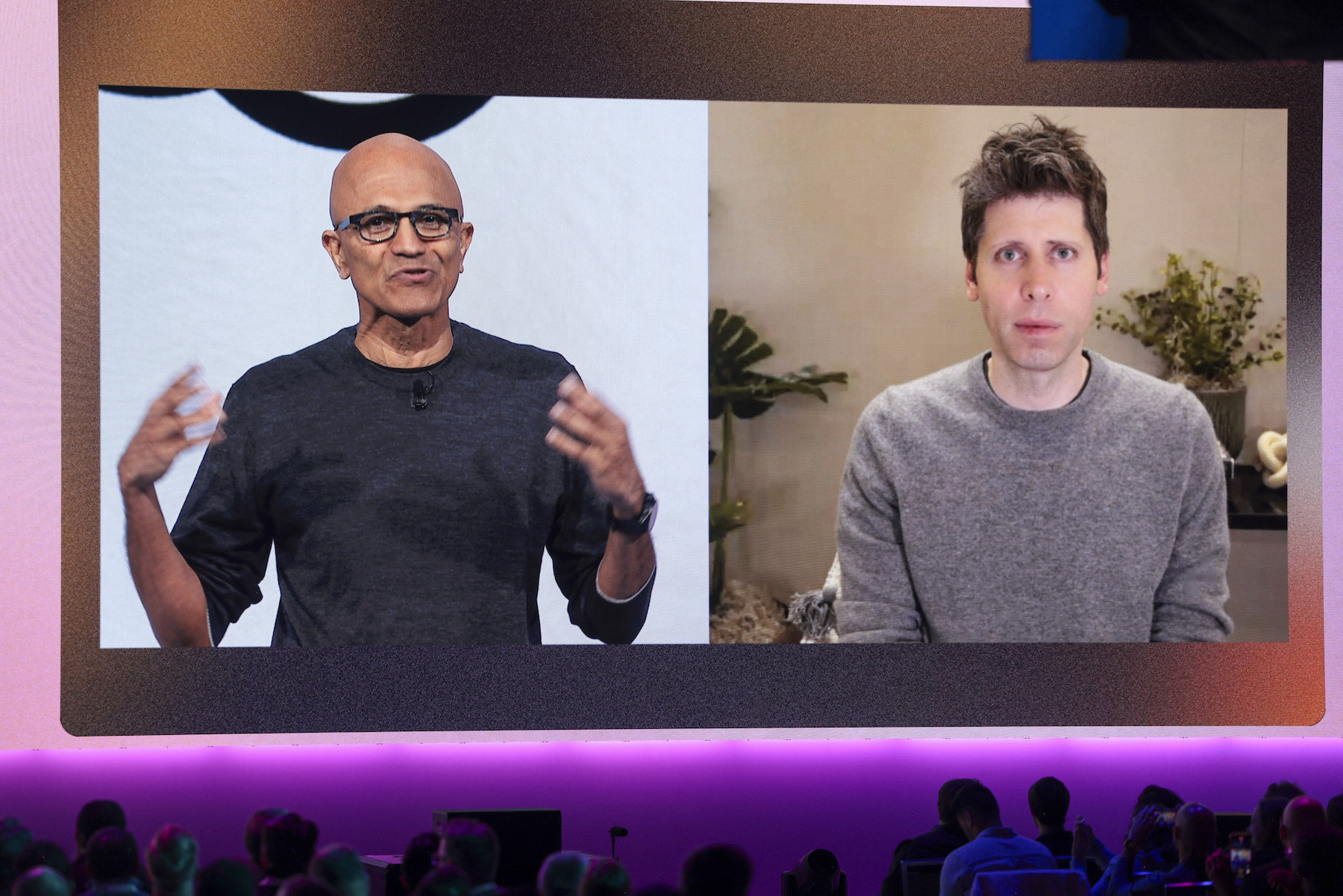 Microsoft Chairman and Chief Executive Officer Satya Nadella (L), speaks with OpenAI Chief Executive Officer Sam Altman, who joined by video during the Microsoft Build 2025, conference in Seattle, Washington on May 19, 2025. (Photo by Jason Redmond / AFP)