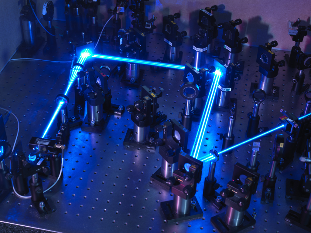 a laser shooting through lenses