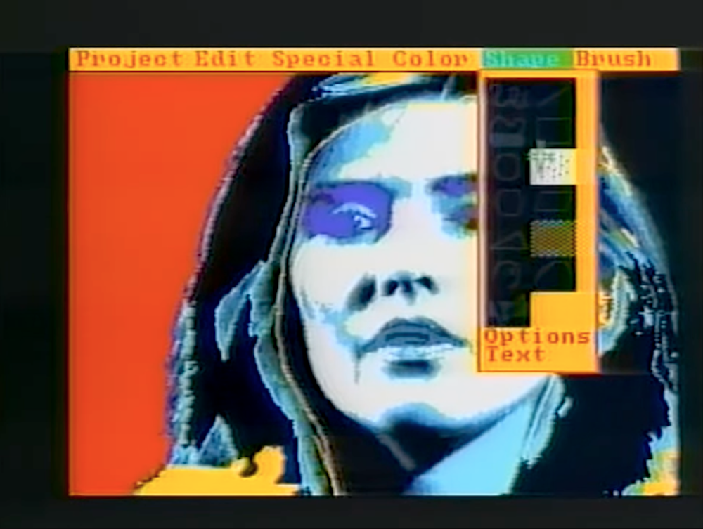 Screenshot of Andy Warhol making digital portrait of Debbie Harry using Amiga's painter software