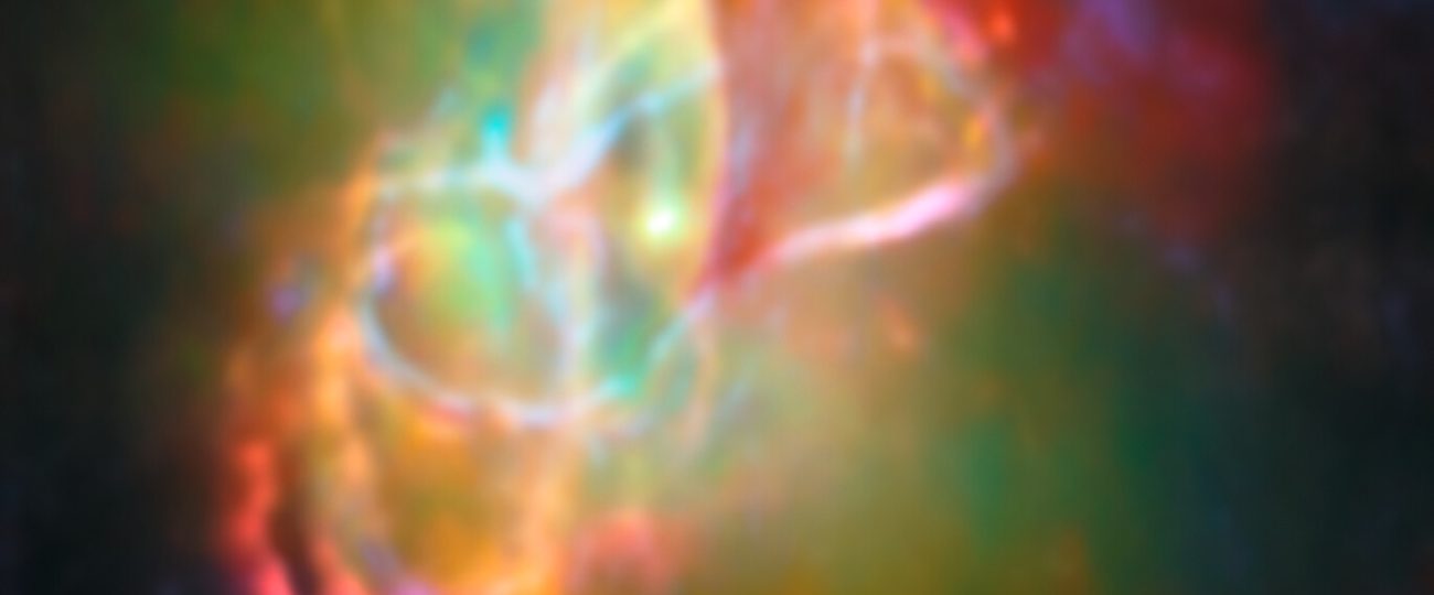 Colorful space ‘butterfly’ glimmers with planet-making dust