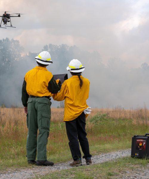These drones drop burning balls in the forest to control wildfires