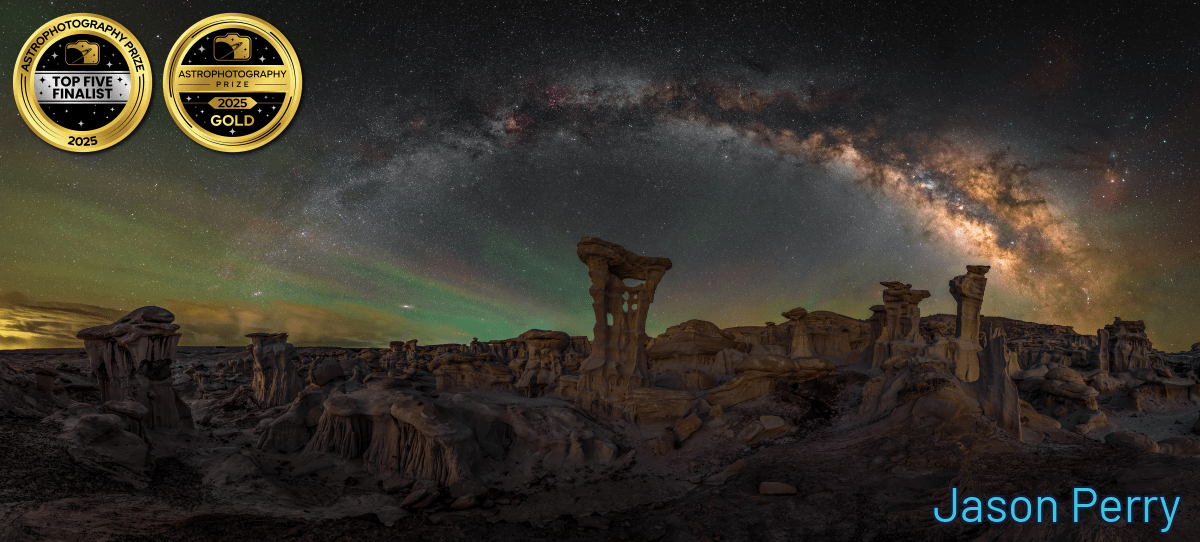 the milky way over a landscape
