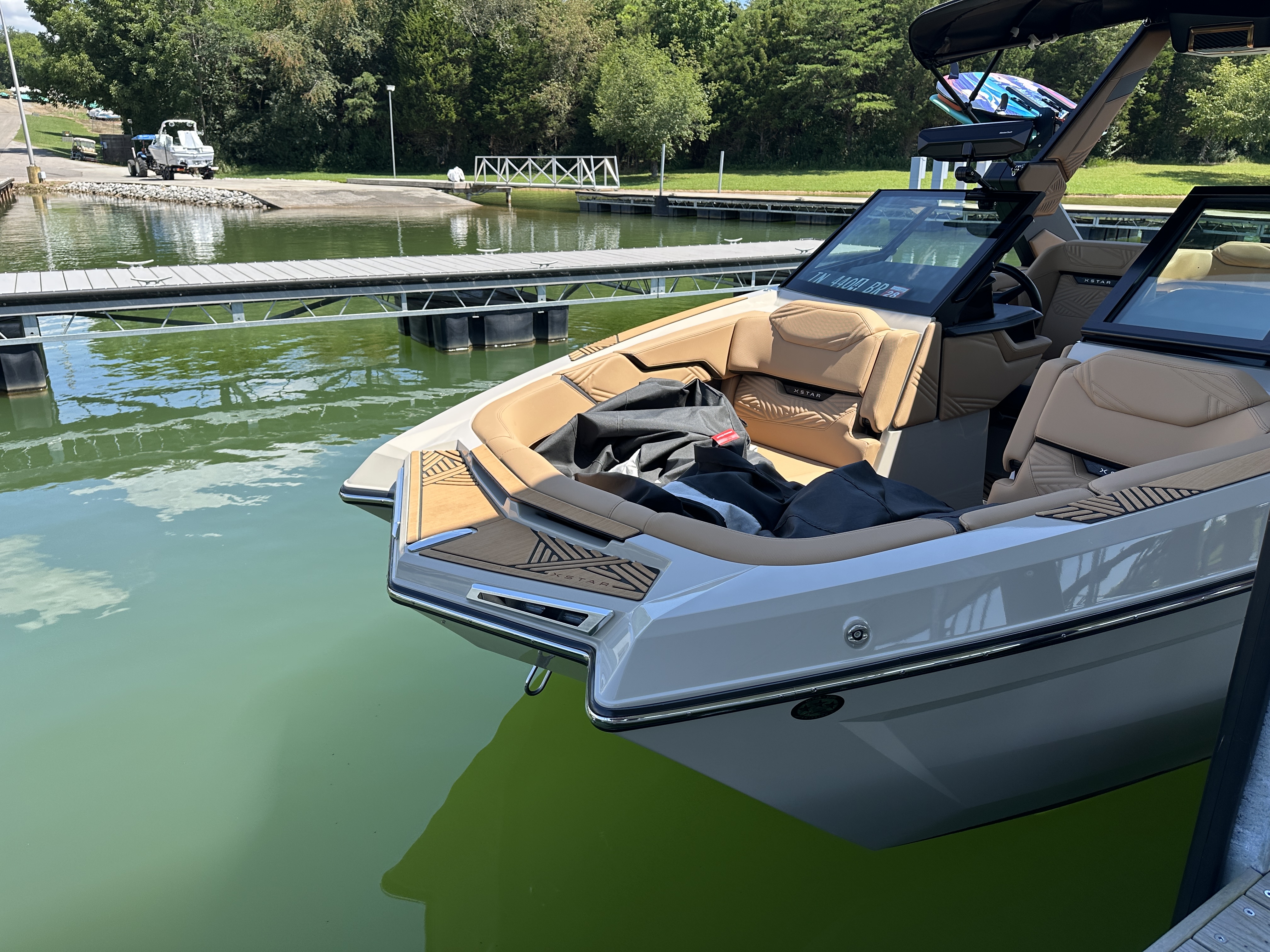 the front of a boat parked at a dock