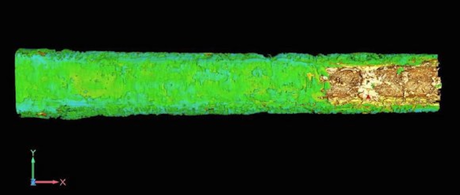 Imaging was able to display the sword's individual layers. The green seen here is the remnants of its sheath.