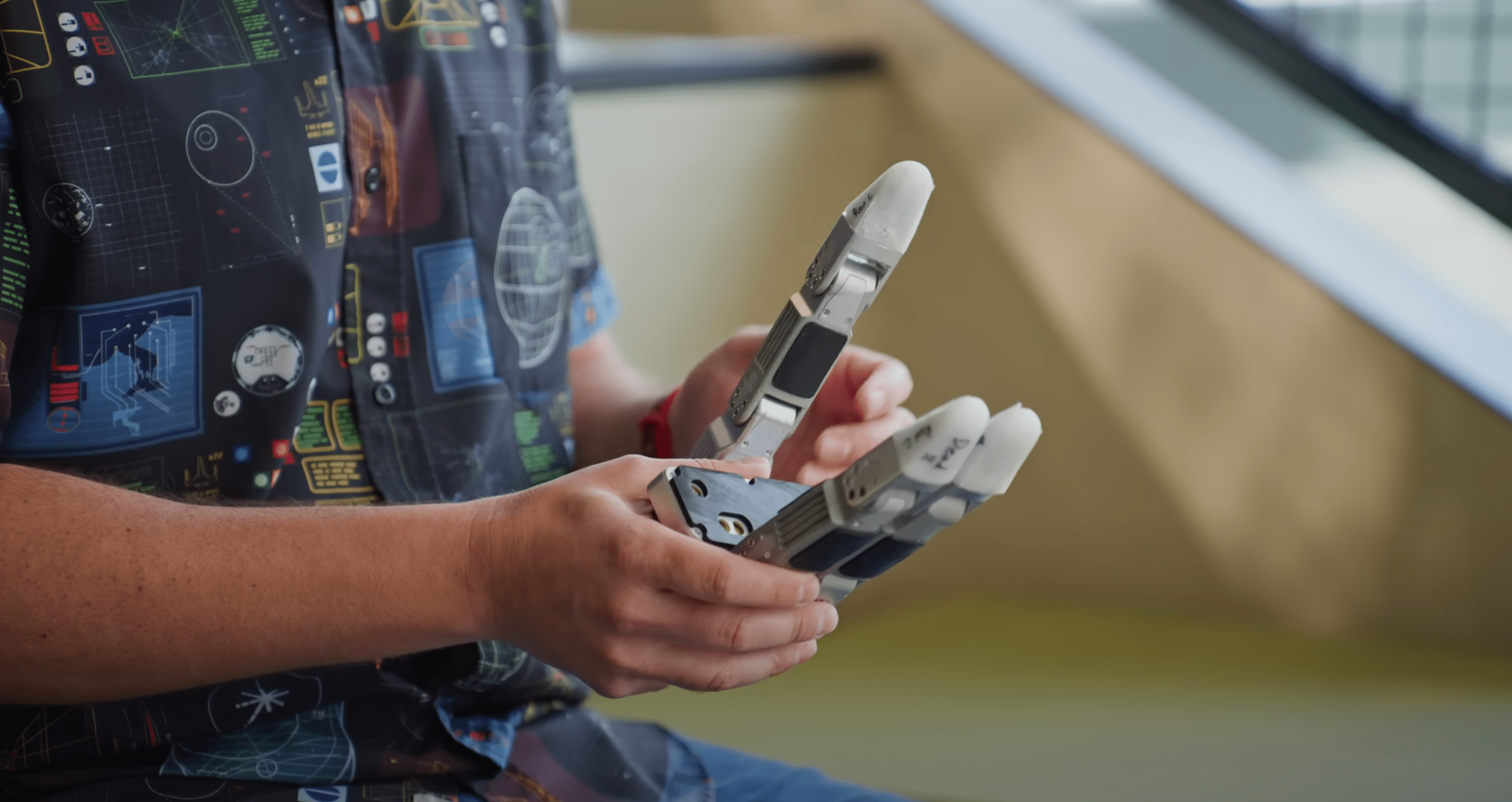 Atlas hand with human hand