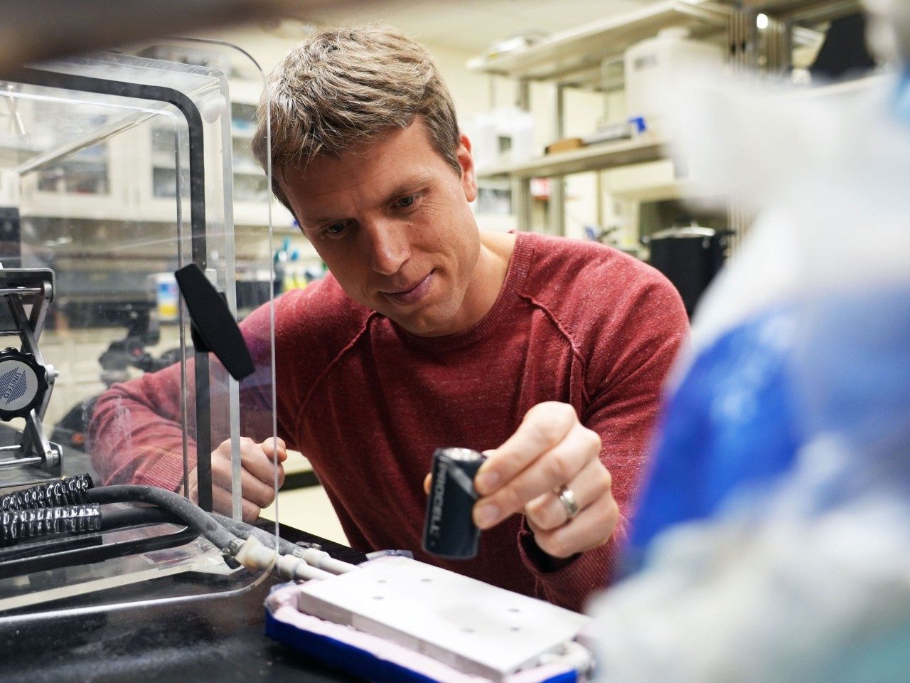 Associate Professor Jonathan Boreyko introduces voltage to a layer of frost in his lab, moving his defrosting research forward with a new approach.
