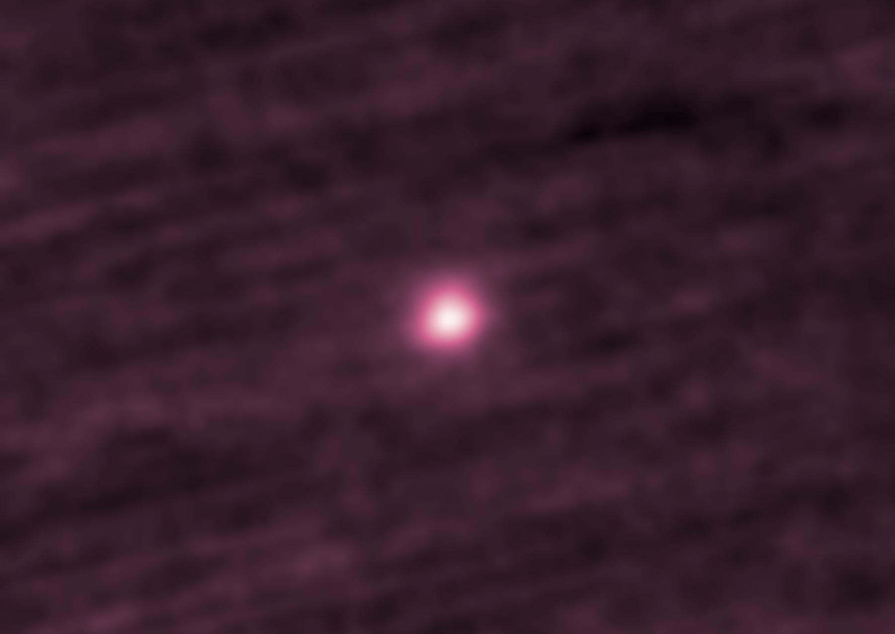 This image shows the 3I/ATLAS interstellar comet as a bright, fuzzy orb in the center. Traveling through our solar system at 130,000 miles (209,000 kilometers) per hour, 3I/ATLAS was made visible by using a series of colorized stacked images from Sept. 11-25, using the Heliocentric Imager-1 (H1) instrument, a visible-light imager on the STEREO-A (Solar Terrestrial Relations Observatory) spacecraft. The colorization was applied to differentiate the image from other observing spacecraft images.