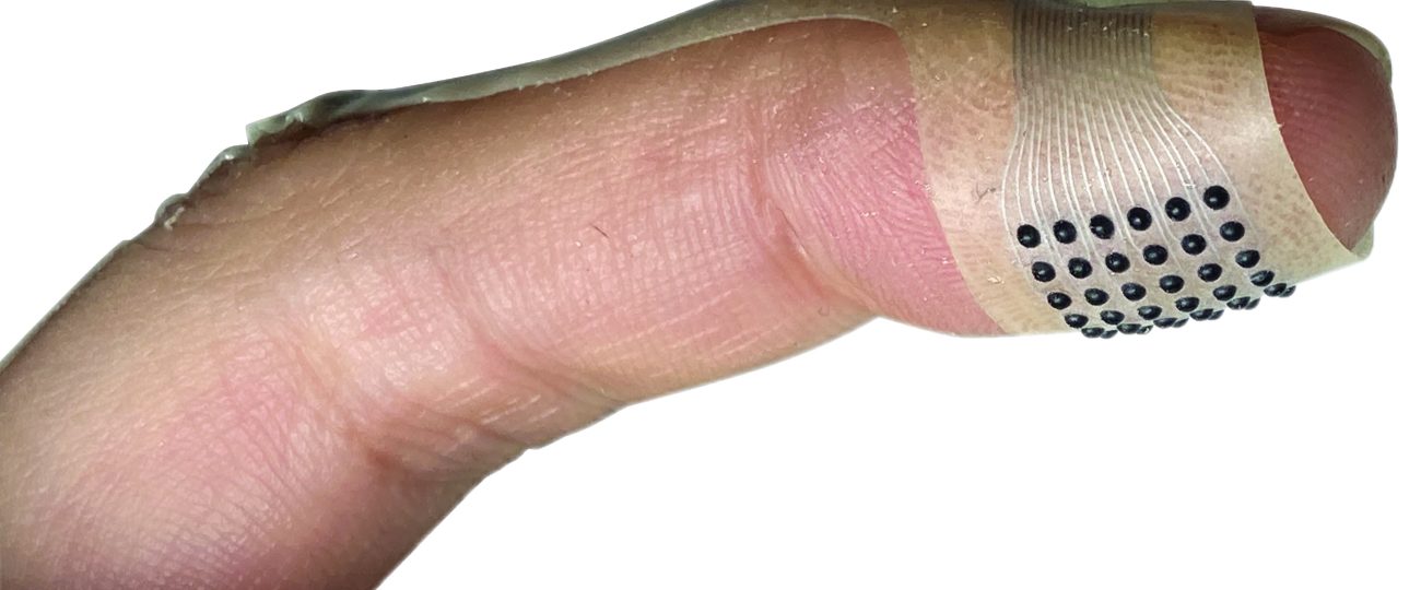 New wearable device lets you touch fabric online, read braille, and more