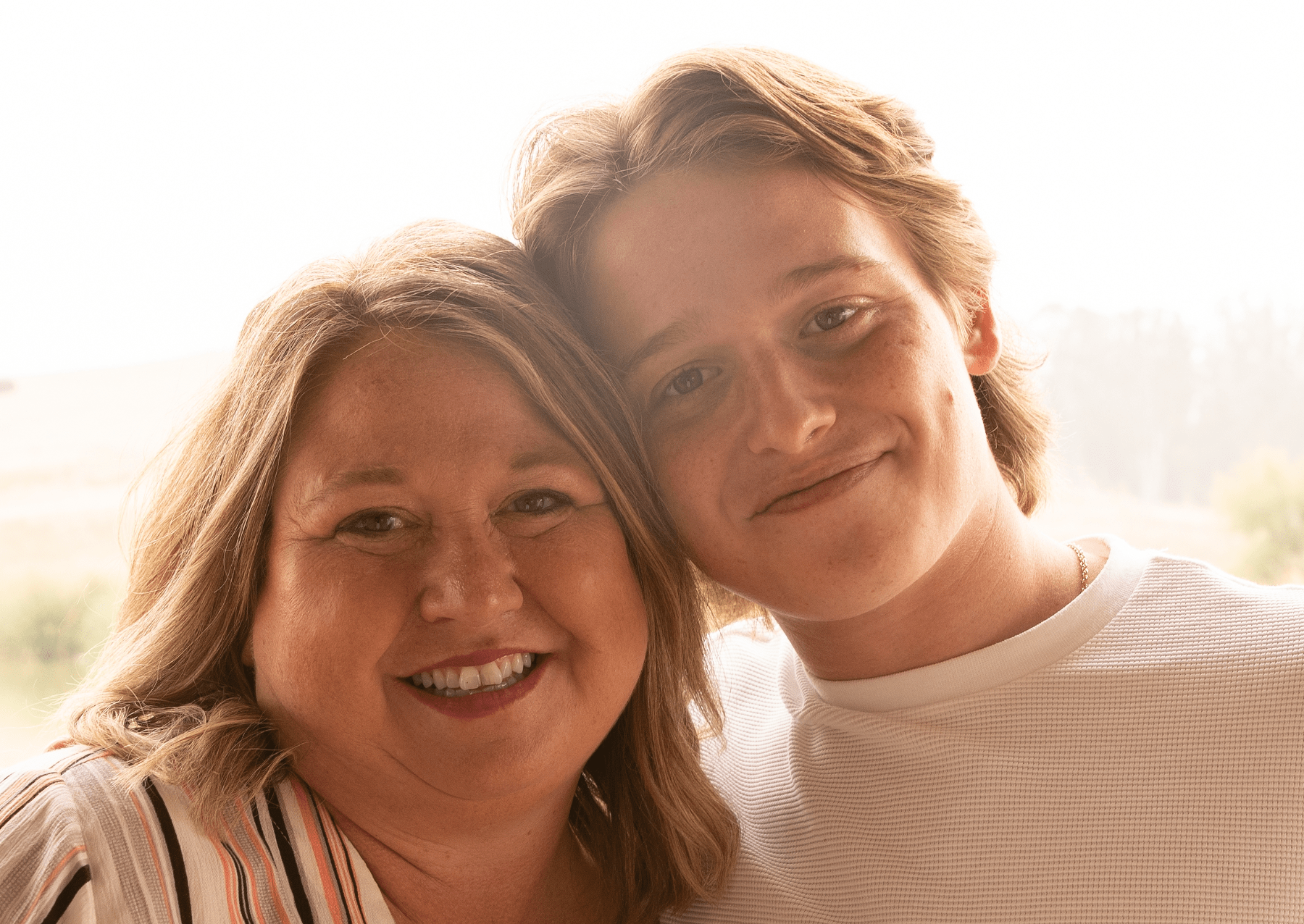 a woman with her teenage son