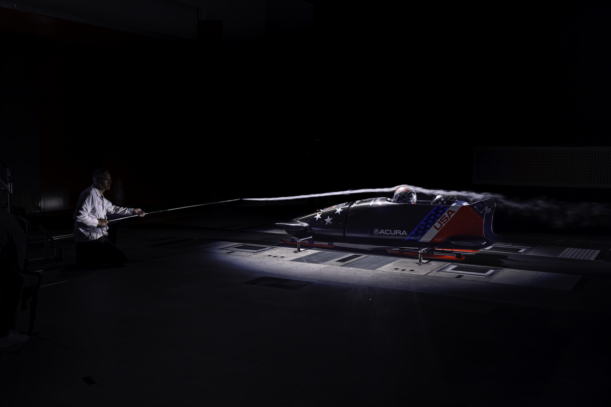 an engineer shoots air over a bobsled