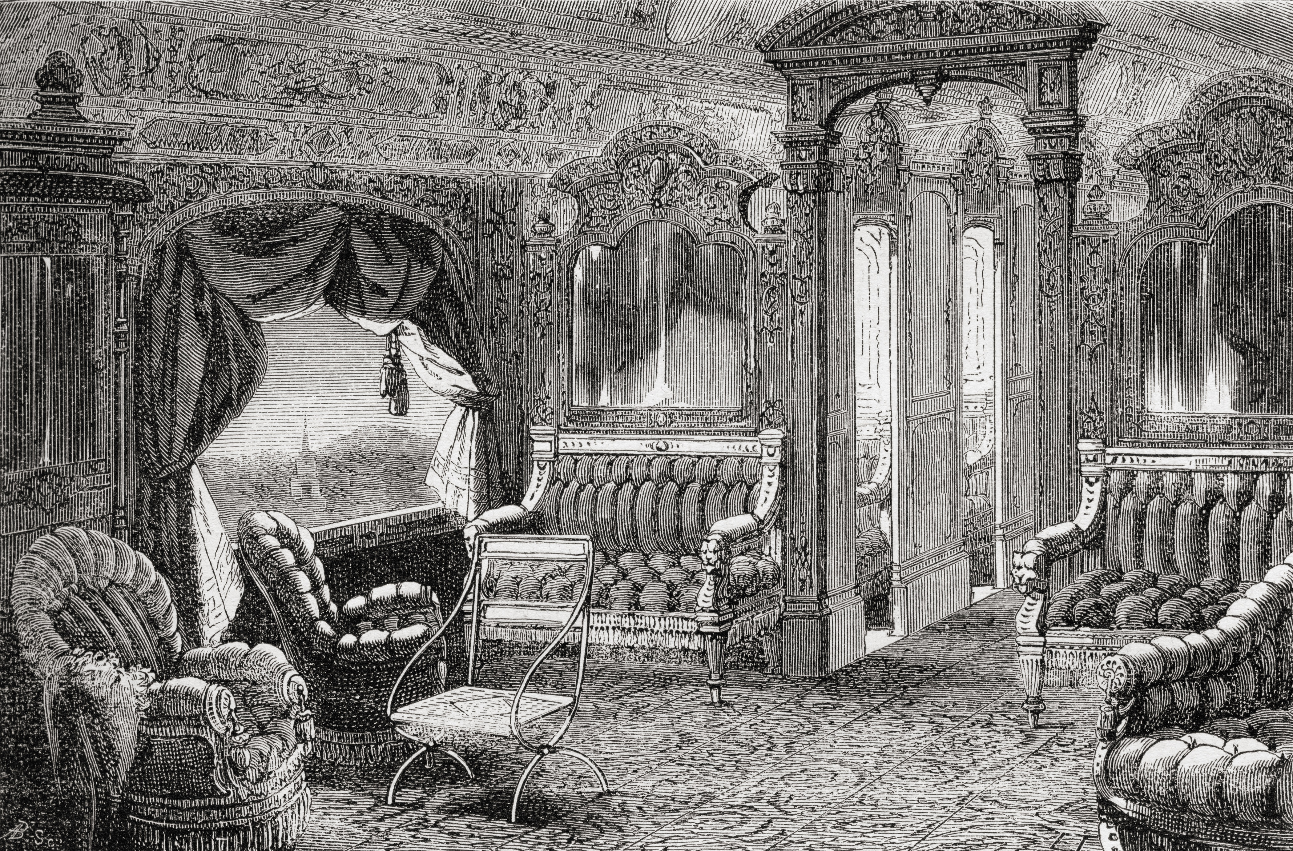 Luxurious interior of a Pullman Palace Railway Carriage in the 19th century. Upholstered chairs are arranged in a lavish parlor with heavy drapes, carpeting, and an ornate ceiling.