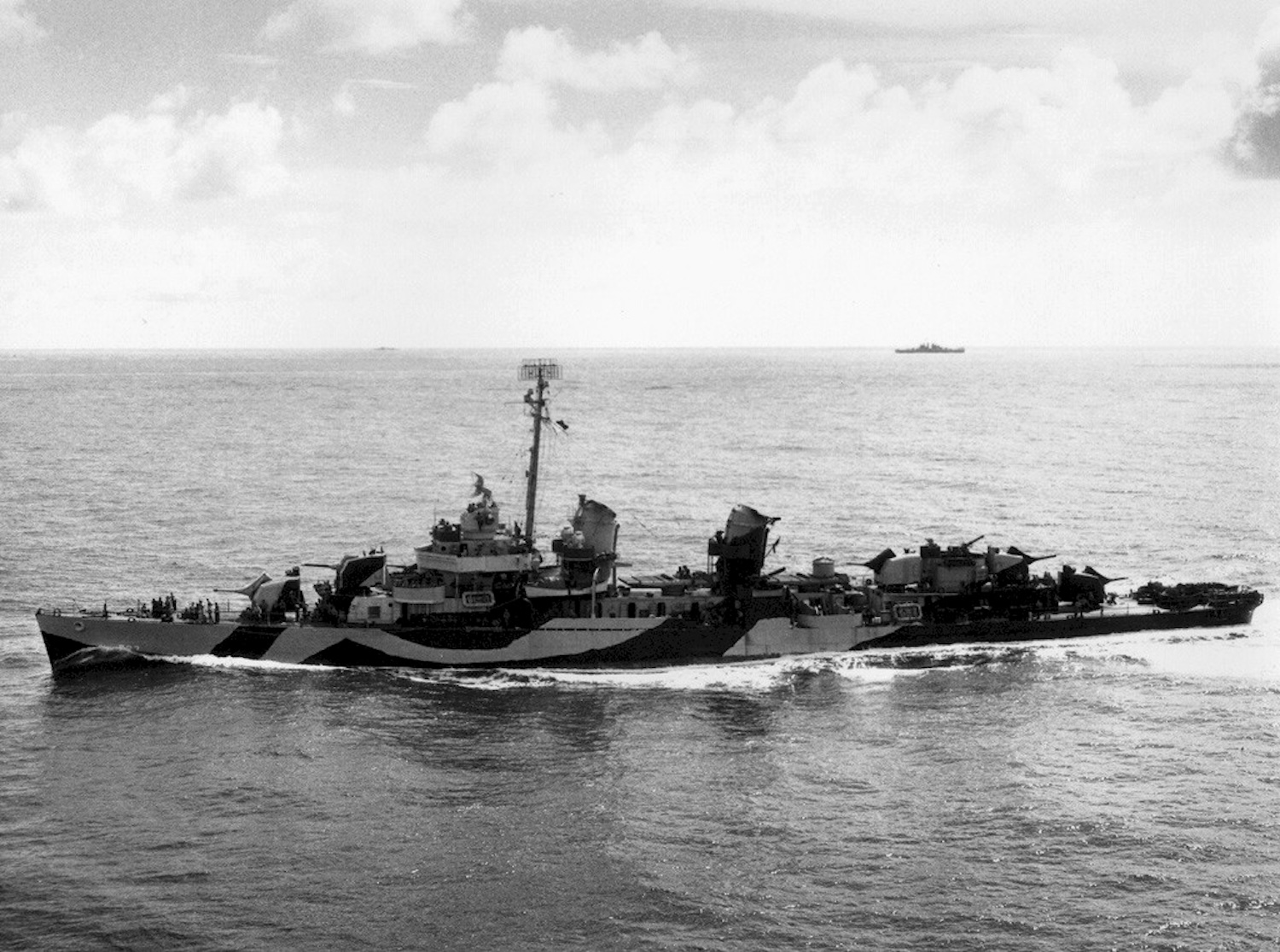 Black and white photo of USS Cassin Young, a Fletcher-class destroyer, at sea